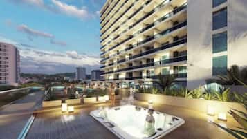Outdoor pool, open 8:00 AM to 8:00 PM, pool umbrellas
