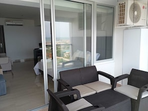 Estúdio conforto, vista para a praia | Sacada