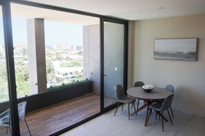 Apartment, Multiple Beds, Balcony, City View (Ocean's Point by Baja Toms) | Dining - Ocean's Point by Baja Toms (Cabo San Lucas)