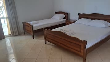 Economy Room, Balcony, Garden View | Iron/ironing board, free WiFi