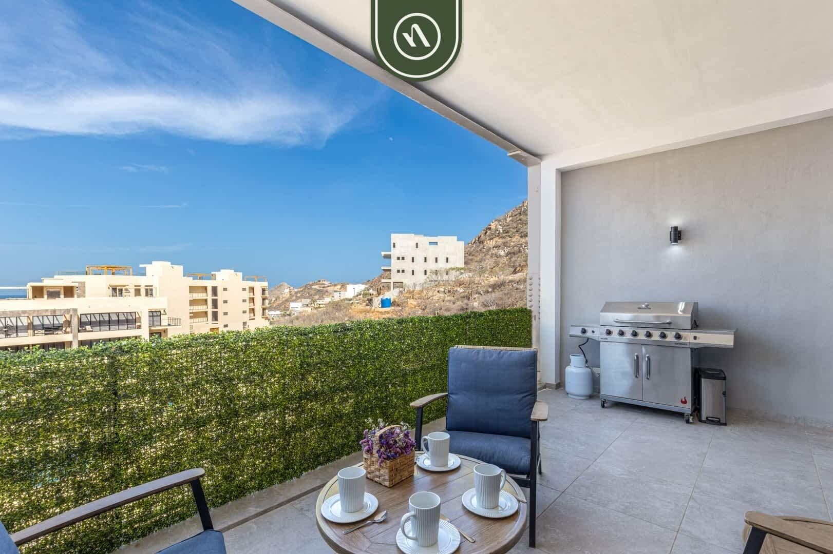 Departamento, varias camas, balcón, vista a la ciudad (Torre Maria 101) | Restaurante al aire libre