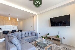 Apartment, Multiple Beds, Balcony, City View (Torre Maria 101) | Living area | 42-inch flat-screen TV with digital channels - New 2 BR Condo With Private Terrace - BBQ (Cabo San Lucas)