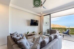 Apartment, Multiple Beds, Balcony, City View (Torre Maria 101) | Living area | 42-inch flat-screen TV with digital channels - New 2 BR Condo With Private Terrace - BBQ (Cabo San Lucas)