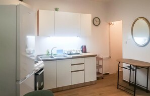 Refrigerador, horno, placa de cocina