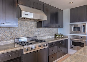 Apartment, Multiple Beds, Balcony, Ocean View (Tortuga Bay TBB 2401) | Private kitchen | Coffee/tea maker, dining tables