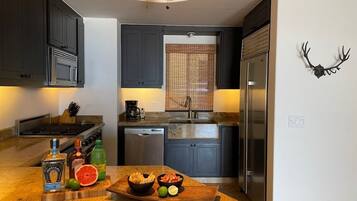 Apartment, Multiple Beds, Balcony, Ocean View (Tortuga Bay TBB 2502) | Private kitchen | Coffee/tea maker, dining tables