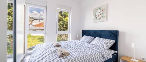 Luxury Apartment, City View | Desk, laptop workspace, blackout drapes, soundproofing