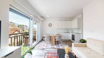 Luxury Apartment, City View | Desk, laptop workspace, blackout drapes, soundproofing