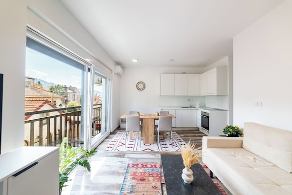 Luxury Apartment, City View | Desk, laptop workspace, blackout drapes, soundproofing