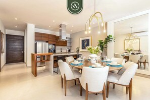 Apartment, Multiple Beds, Balcony, Pool View (VistaVela III 3204) | Private kitchen | Coffee/tea maker, dining tables - Modern 2 BR Apartment With Pool - Clubhouse - Gym (Cabo San Lucas)