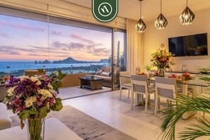 Apartment, Multiple Beds, Balcony, Ocean View (VistaVela II PH 2607) | Living area | 42-inch flat-screen TV with digital channels, fireplace