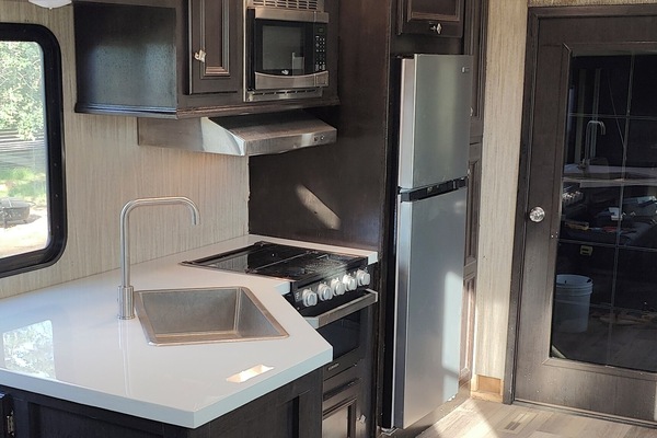 view of the kitchen and the door going to the secound bedroom
