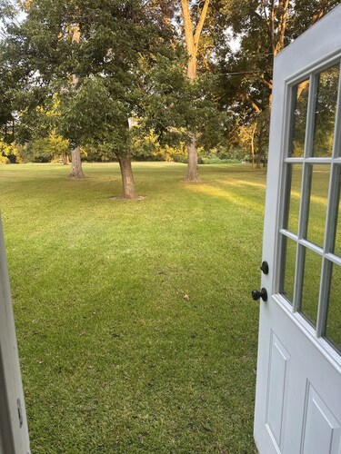 Historic cottage privately situated on the grounds of the Foster Mounds.