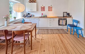 Fridge, stovetop, dishwasher, coffee/tea maker
