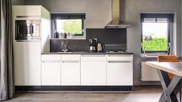 Fridge, stovetop, dishwasher, coffee/tea maker