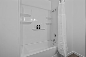 Standard Apartment, 1 Bedroom (Apartment) | Bathroom | Combined shower/tub, hair dryer, towels, soap