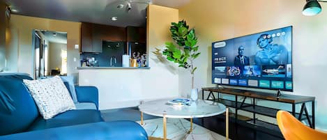 Standard Apartment, 1 Bedroom (Apartment) | Living area | 50-inch Smart TV with digital channels