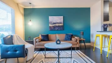 Standard Apartment, 1 Bedroom (Apartment) | Living area | 50-inch Smart TV with digital channels