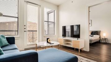 Standard Apartment, 2 Bedrooms (Apartment) | Living area | 50-inch Smart TV with digital channels