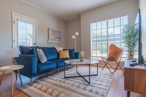 Standard Apartment, 1 Bedroom (Apartment) | Living area | 50-inch Smart TV with digital channels - Irving Apartments (Irving)