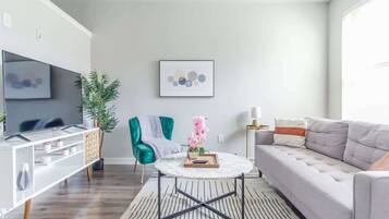 Standard Apartment, 1 Bedroom (Apartment) | Living area | 50-inch Smart TV with digital channels