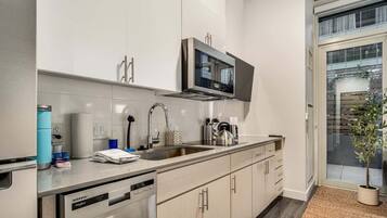 Standard Apartment (Apartment) | Private kitchen | Full-size fridge, microwave, stovetop, dishwasher