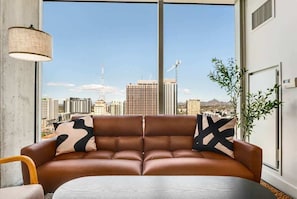 Standard Apartment (Apartment) | Living area | 50-inch Smart TV with digital channels - Boulevard Stays - Phoenix Convention Center (Phoenix)