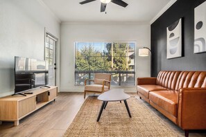 Standard Apartment, 2 Bedrooms (Apartment) | Living area | 50-inch Smart TV with digital channels