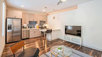 Standard Apartment, 1 Bedroom (Apartment) | Living area | 50-inch Smart TV with digital channels