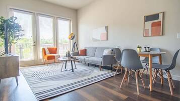 Standard Apartment, 2 Bedrooms (Apartment) | Living area | 50-inch Smart TV with digital channels