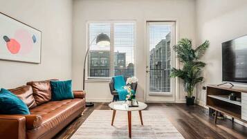 Standard Apartment, 1 Bedroom (Apartment) | Living area | 50-inch Smart TV with digital channels