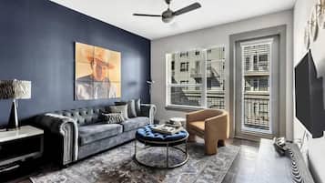 Standard Apartment, 1 Bedroom (Apartment) | Living area | 50-inch Smart TV with digital channels