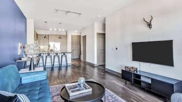Standard Apartment, 1 Bedroom (Apartment) | Living area | 50-inch Smart TV with digital channels