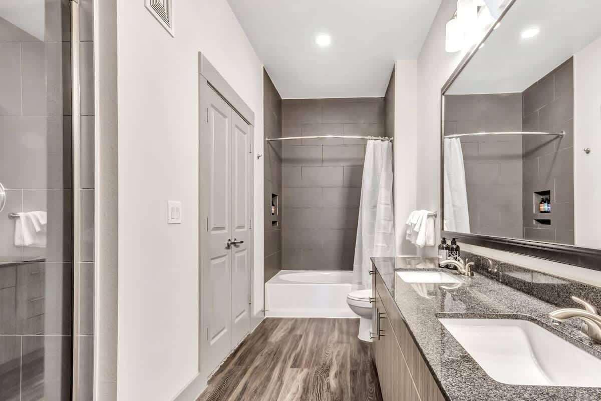 Combined shower/tub, hair dryer, towels, soap