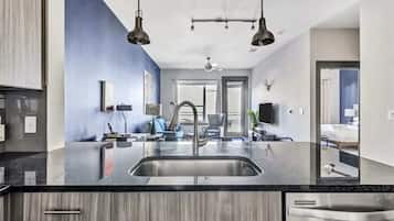 Standard Apartment, 1 Bedroom (Apartment) | Living area | 50-inch Smart TV with digital channels