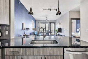 Standard Apartment, 1 Bedroom (Apartment) | Living area | 50-inch Smart TV with digital channels
