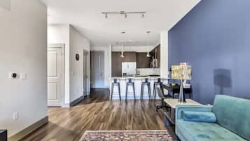 Standard Apartment, 1 Bedroom (Apartment) | Living area | 50-inch Smart TV with digital channels