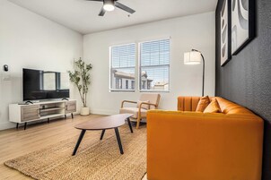 Standard Apartment, 1 Bedroom (Apartment) | Living area | 50-inch Smart TV with digital channels