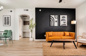 Standard Apartment, 1 Bedroom (Apartment) | Living area | 50-inch Smart TV with digital channels