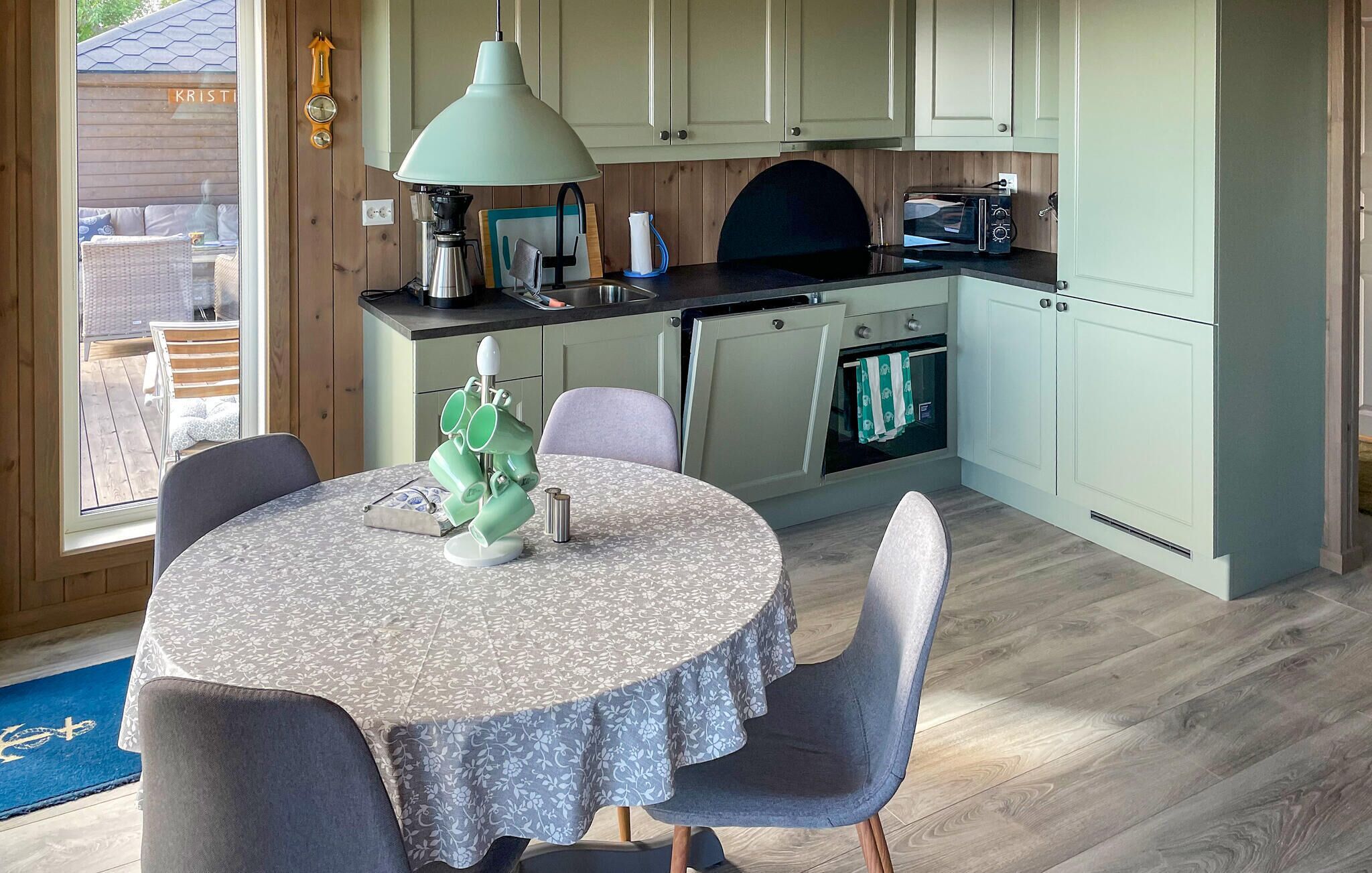 Fridge, stovetop, dishwasher, coffee/tea maker