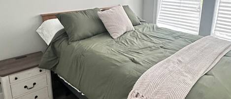 2 dormitorios, tabla de planchar con plancha, wifi gratis y ropa de cama