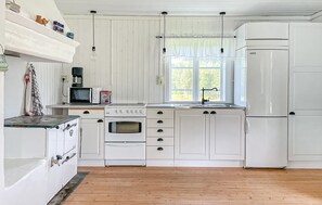 Fridge, stovetop, coffee/tea maker