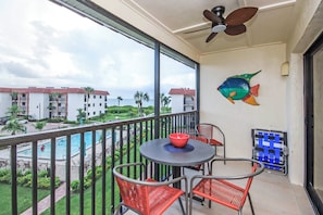 Outdoor dining - Island oasis - Beachfront condo on Sanibel Island - Sandalfoot 2C3 (Sanibel Island)