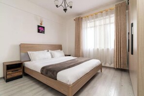 2 habitaciones, tabla de planchar con plancha y acceso a internet 