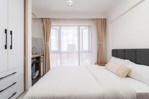 1 chambre, fer et planche à repasser, accès à Internet, literie fournie