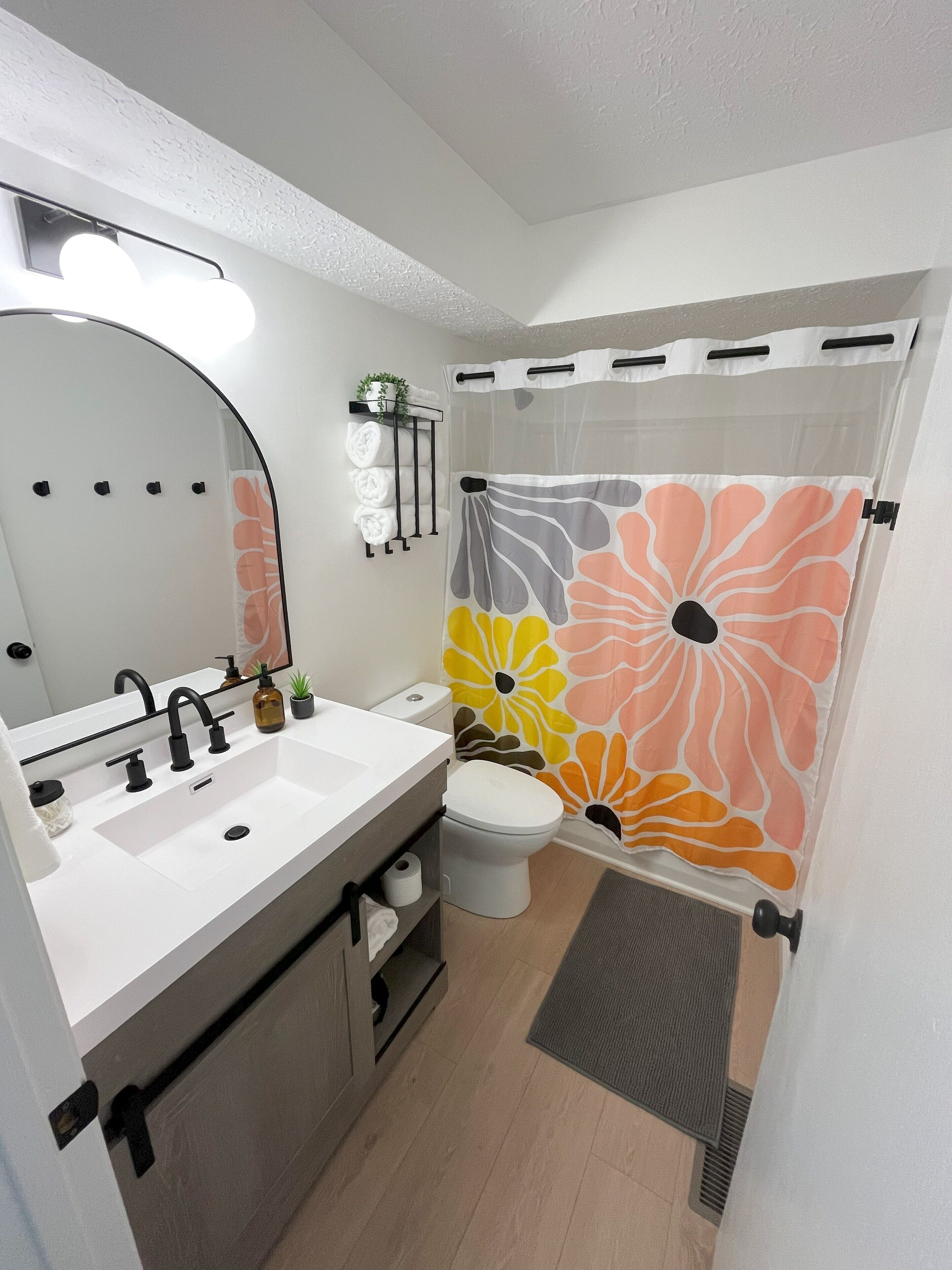 Hair dryer, towels, soap, toilet paper