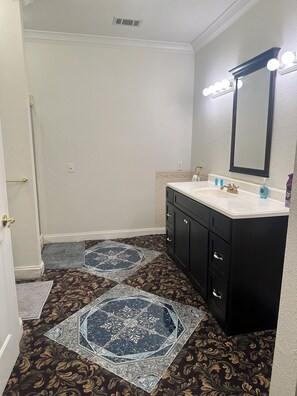 Jetted bath, towels, soap, toilet paper