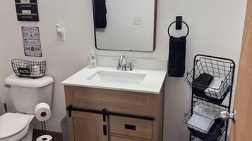 Hair dryer, towels, soap, toilet paper