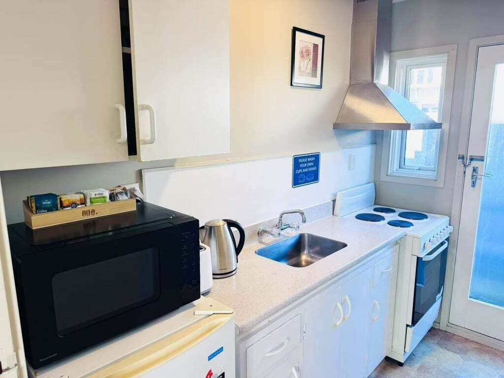 Fridge, coffee/tea maker, electric kettle, toaster