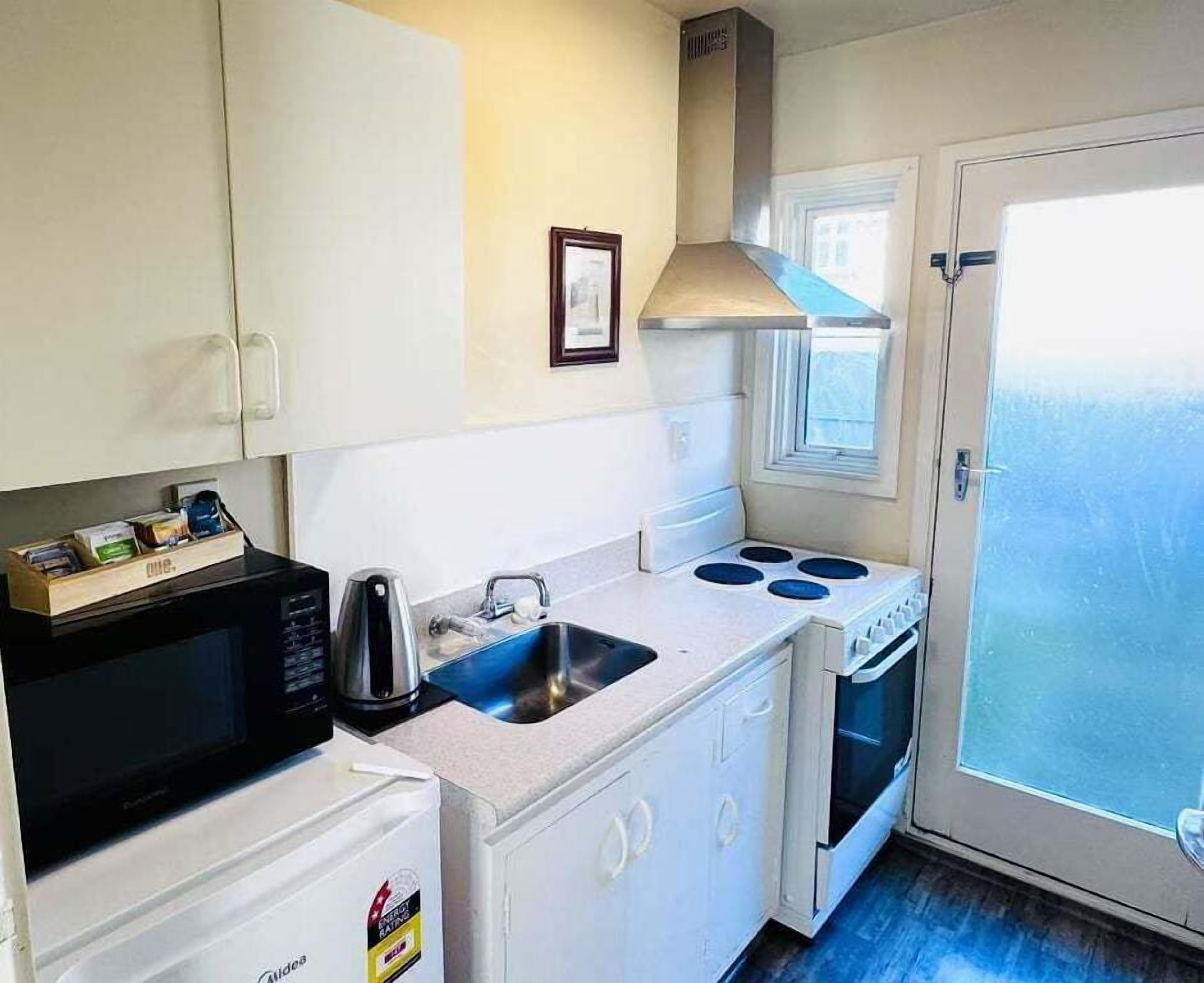 Coffee/tea maker, electric kettle, toaster, dining tables